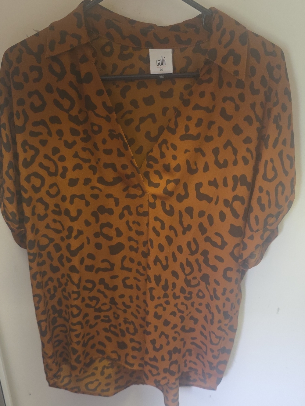 CAbi Leopard Print Short Sleeve Blouse in Rust and Black